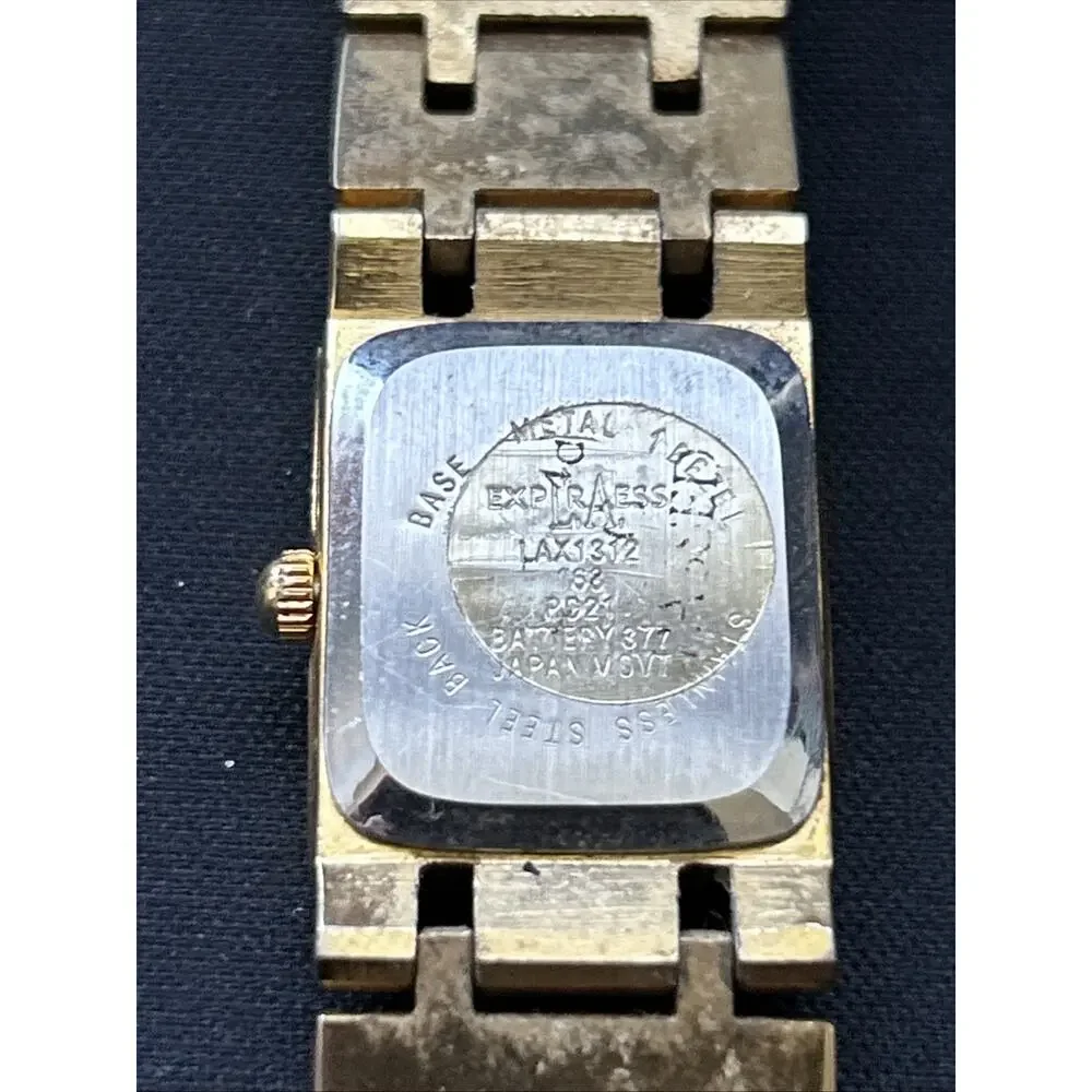 LA Express Silver Tone Dial Gold Tone Case And Band Women’s Quartz Watch